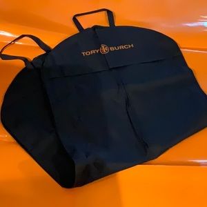 Tory Burch suit taker/guard